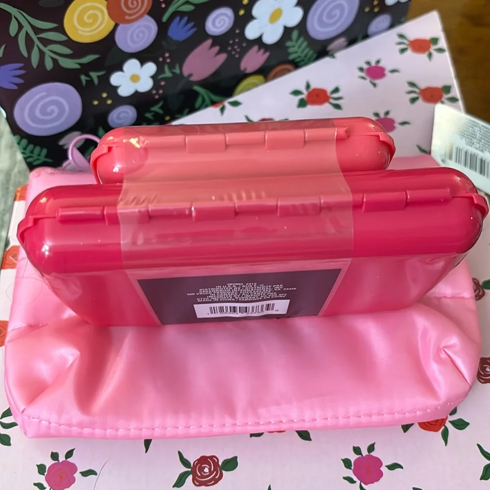 Two Small size cosmetic cases plus free zipper bag